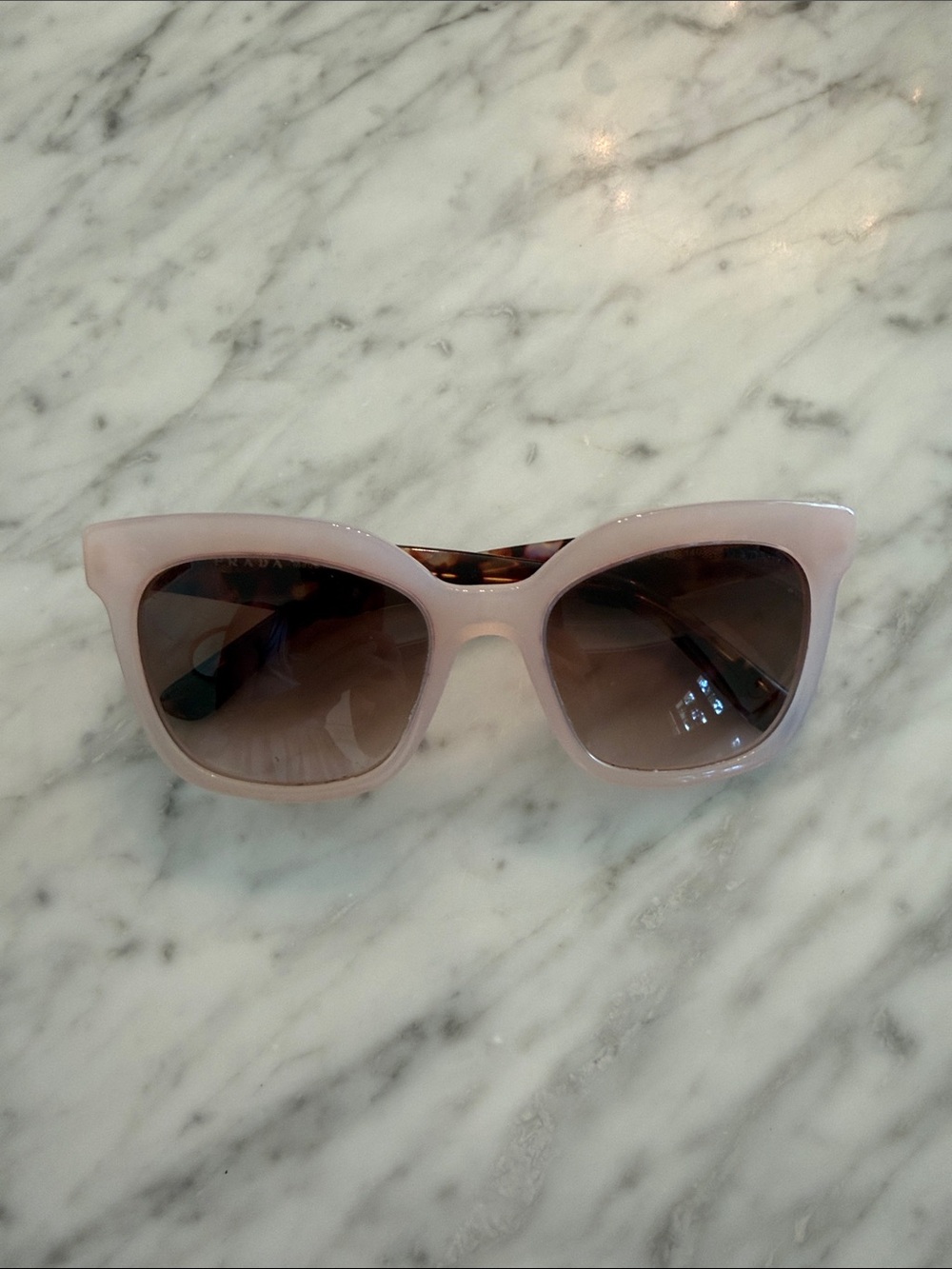 Prada Light Pink Cat-Eye Sunglasses with Brown Gradient Lenses